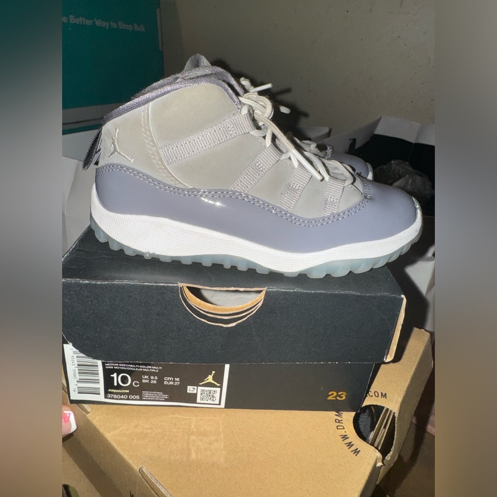 Kids cool grey Jordan 11’s size 10C US